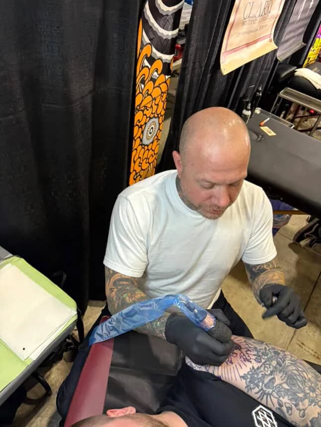 Nate, tattoo artist with 25 years experience at Village Tattoo Company in London Ontario