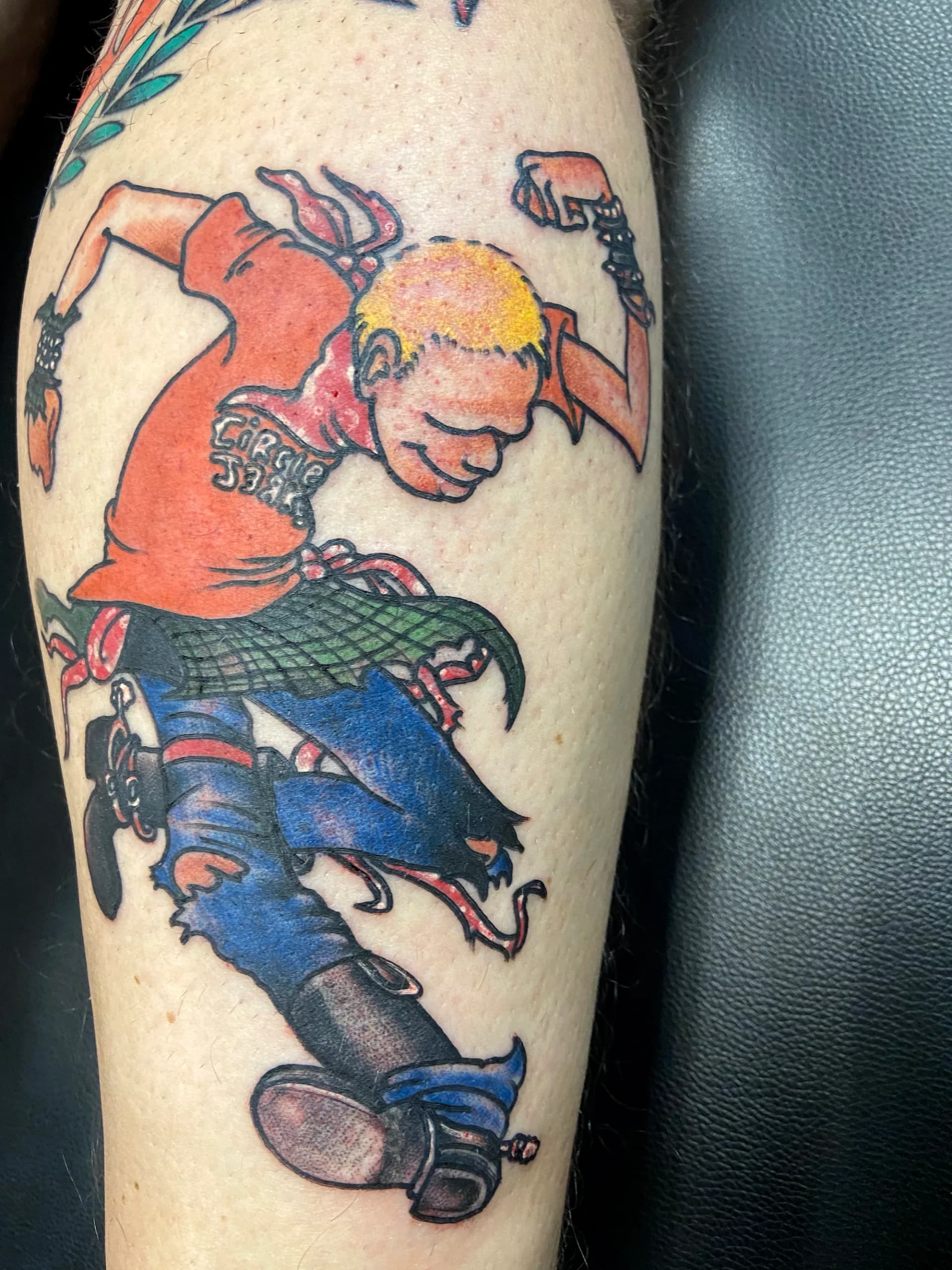 Dancing man traditional colour tattoo by Nate at Village Tattoo Company London Ontario