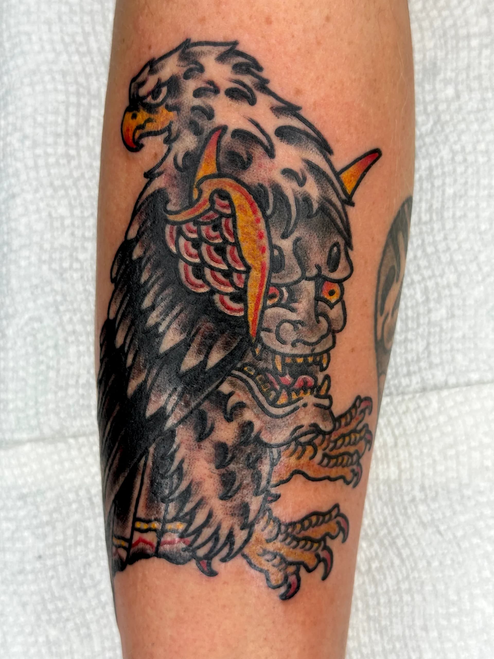 Eagle and hannya mask black and grey bodysuit tattoo by Nate at Village Tattoo Company London Ontario