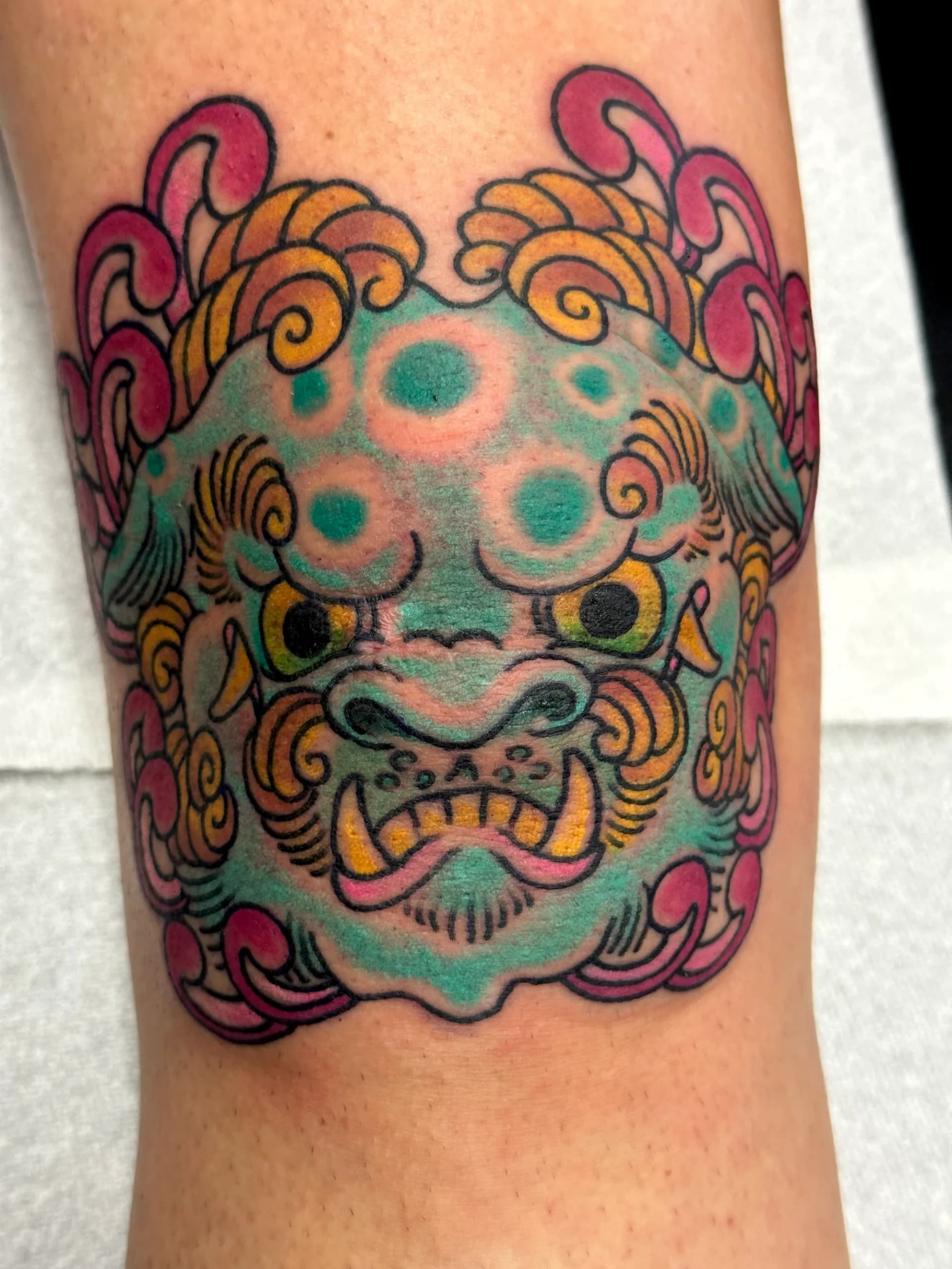 Foo dog head Japanese knee tattoo by Nate at Village Tattoo Company London Ontario