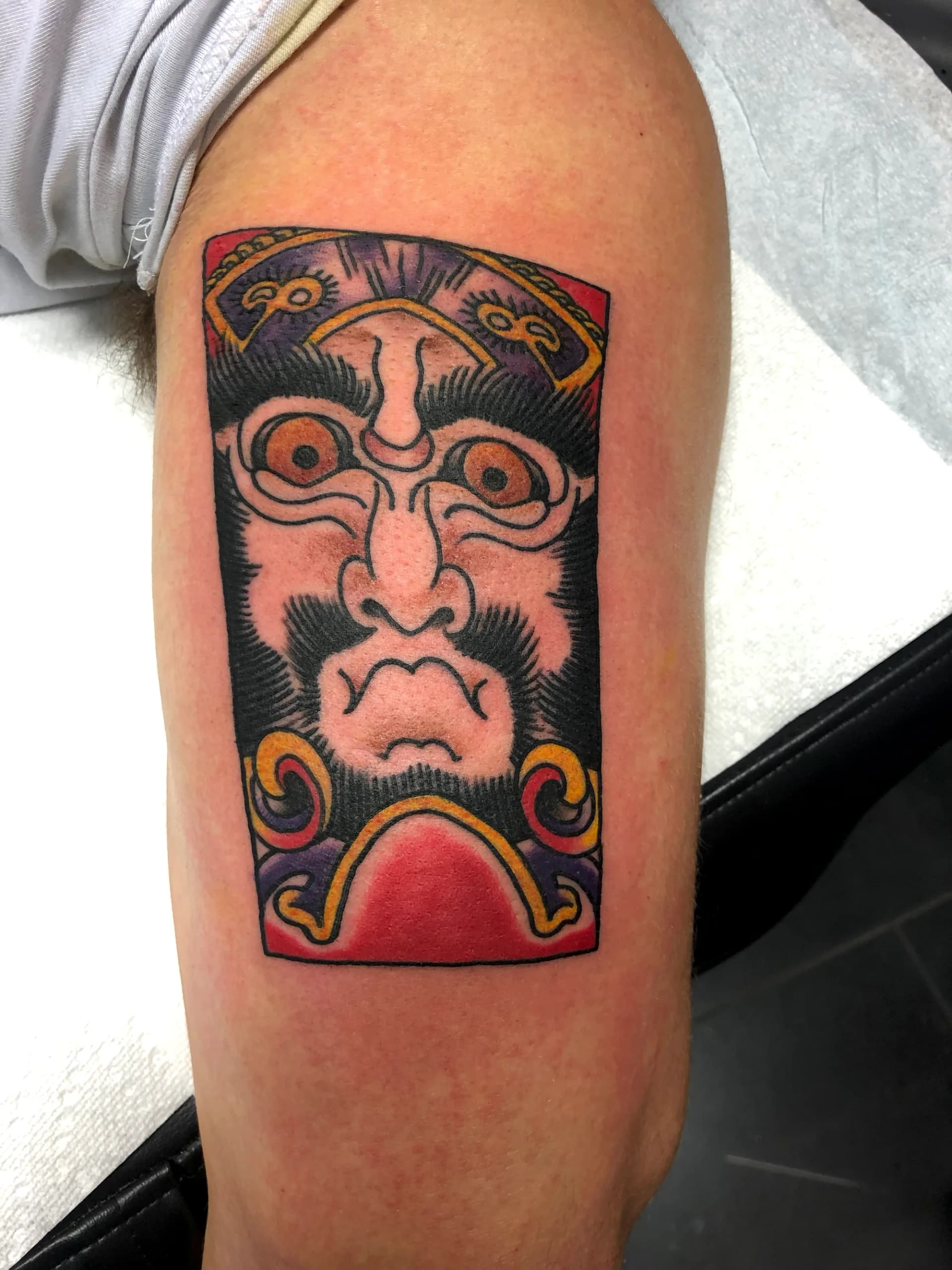 Japanese kite face colour tattoo by Nate at Village Tattoo Company London Ontario