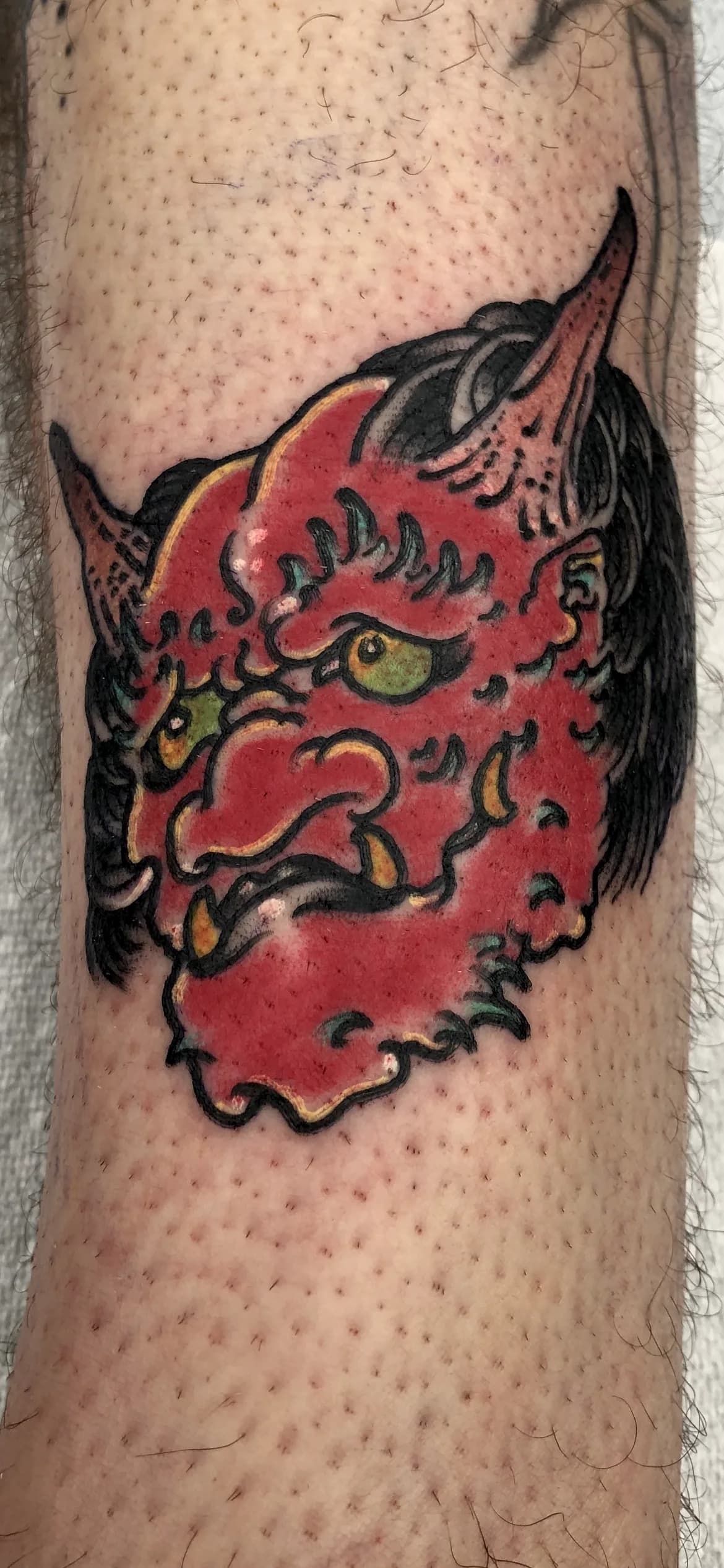 Oni head Japanese colour tattoo by Nate at Village Tattoo Company London Ontario